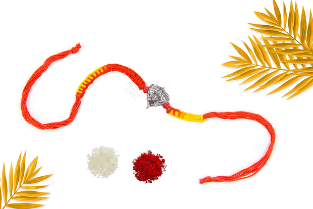 LEAF GANESHA SILVER rakhi FOR BROTHERS with roli chawal